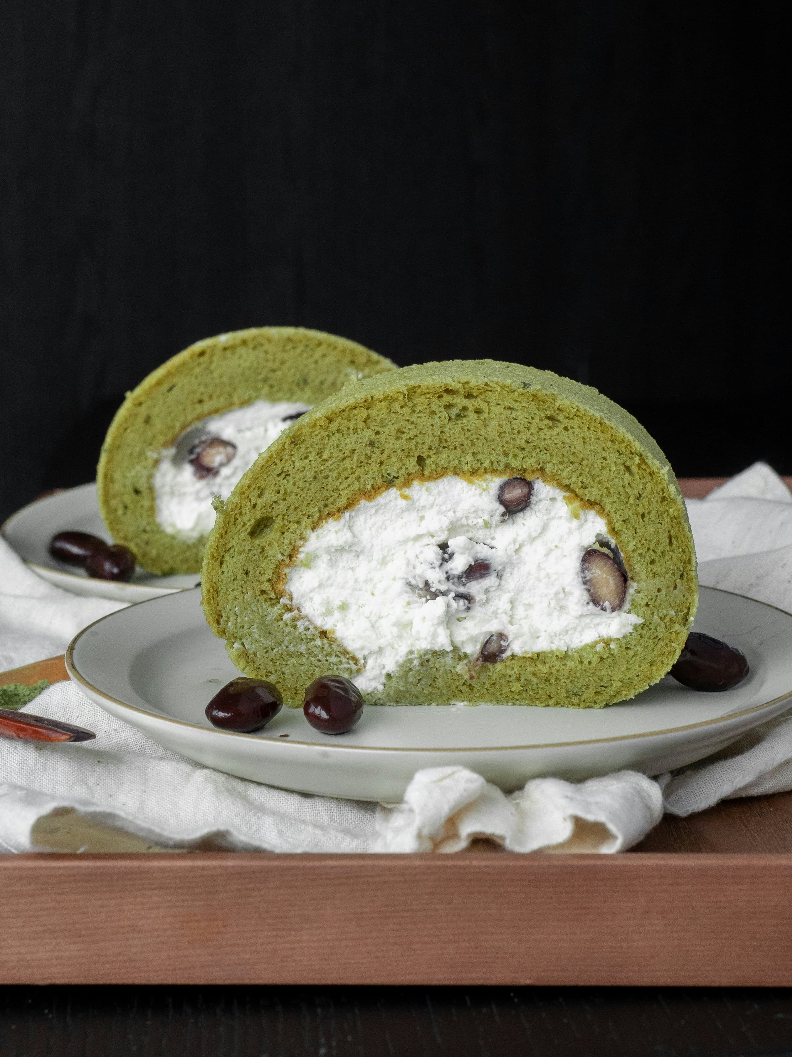 Matcha roll cake with cream and chestnuts